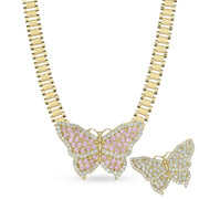 10k gold butterfly pendant with pink and white CZ stones on a Rolex style link chain.