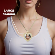 Woman wearing a Size Large 52.0mm gold heart pendant necklace.