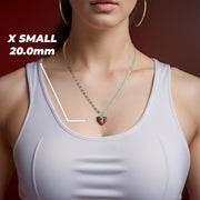 A woman wearing a gold chain necklace with a heart-shaped pendant containing a custom photo.