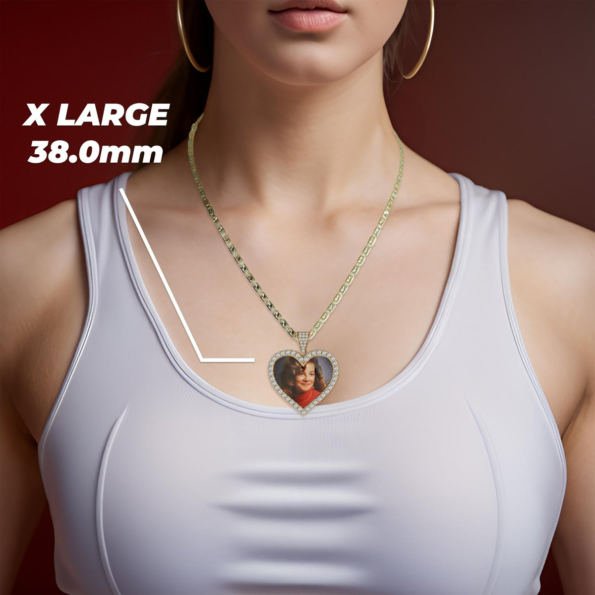 A woman wearing a gold chain necklace with an extra large 38.0mm heart-shaped memorial picture pendant.