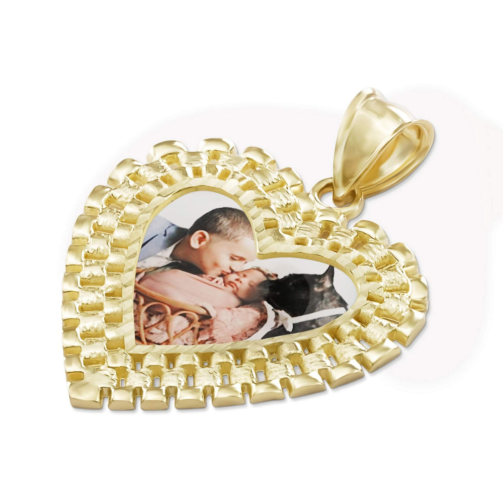 10k yellow gold commemorative heart picture pendant with an ornate textured bezel on white.