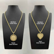 Small round and heart gold memorial pendants on 4.5mm rope chains on display busts
