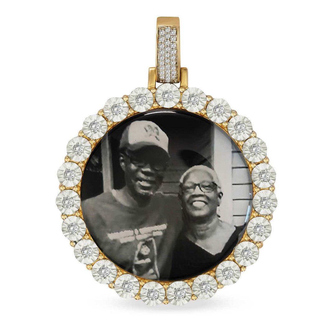 Diamond-cut round gold memorial pendant holding a printed photograph of an elderly couple.