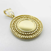 Plain textured back view of a round 10k gold Greek key memorial picture pendant.