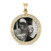 Round 10k gold memorial picture pendant with CZ border showing a photo of a couple.
