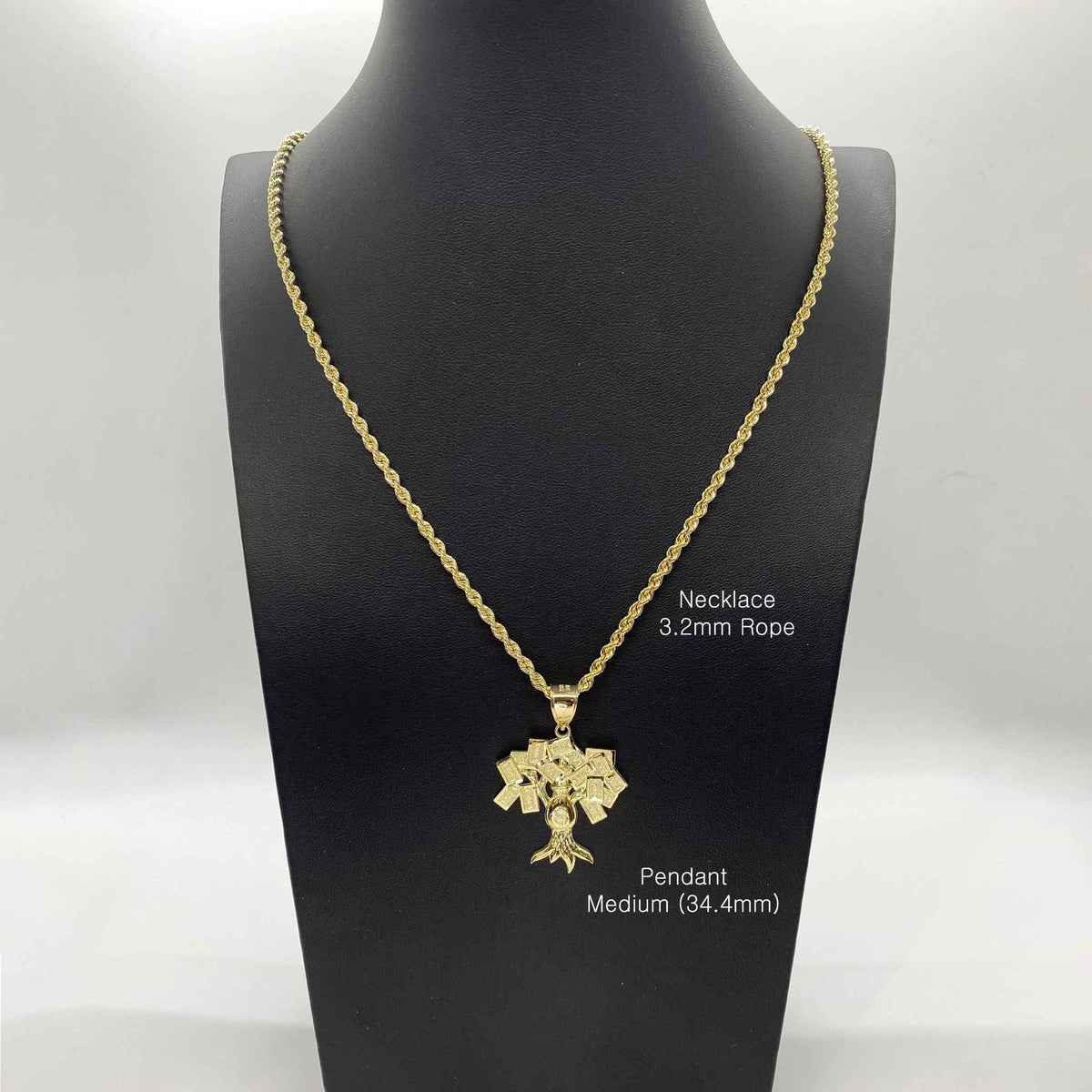 Medium 34.4mm 10k gold money tree pendant on a 3.2mm rope chain shown on a mannequin.
