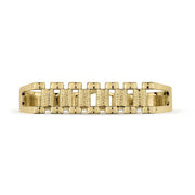Close-up front view of a gold double-finger ring featuring textured watch link patterns.