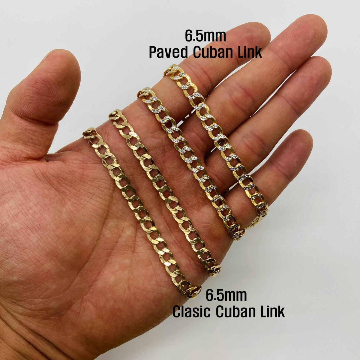 Hand holding four 6.5mm gold chains comparing paved and classic Cuban link styles.