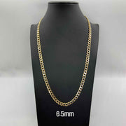 6.5mm 10k gold pave diamond cut Cuban curb chain displayed on black mannequin.