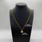 10k gold rope necklace with small 15.8mm pink heart pendant on a black bust.