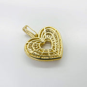 Back view of 10k gold puffy heart pendant showing filigree lattice structure.
