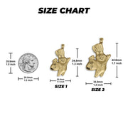 Size chart comparing two 10k gold Pillsbury Doughboy pendants to a US quarter.