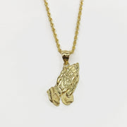 10k solid yellow gold praying hands pendant displayed on a matching gold rope chain.