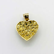 Back view of a 10k solid gold nugget heart charm pendant on white background.