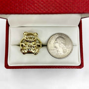10k Gold teddy bear ring in next to a U.S. quarter dollar coin.