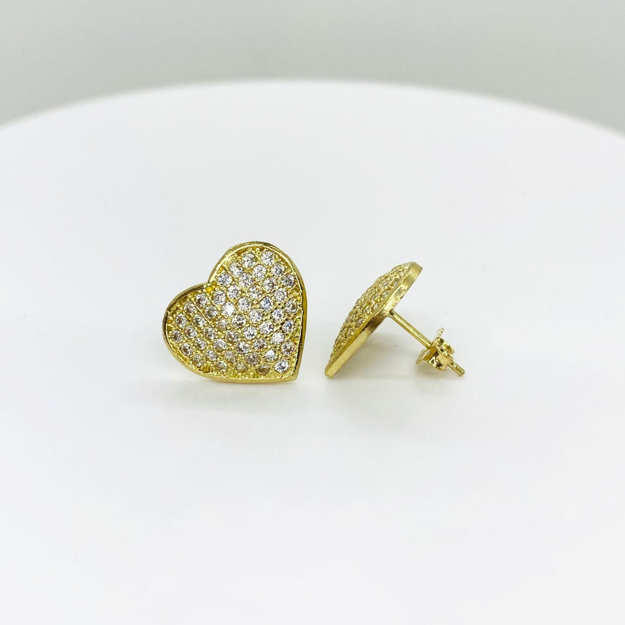 Pair of 10k gold heart-shaped stud earrings featuring pavé-set clear cubic zirconia stones.