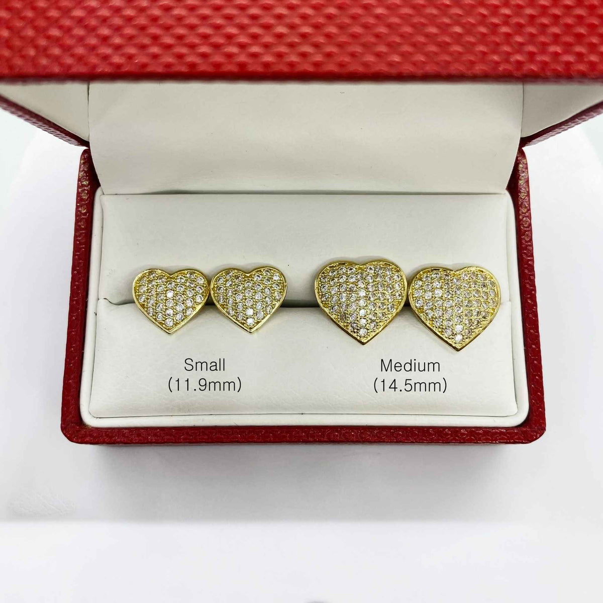 10k gold heart CZ stud earrings in small 11.9mm and medium 14.5mm sizes.