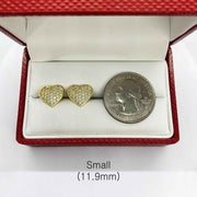 10k gold small heart stud earrings beside a U.S. quarter for size reference.