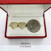 Size comparison of 14.5mm heart-shaped gold CZ earrings and a U.S. quarter coin.