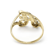 Back angle of a vintage yellow gold nugget signet ring on white background.