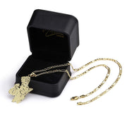 10k gold Pillsbury Doughboy pendant necklace displayed with an open black jewelry box.