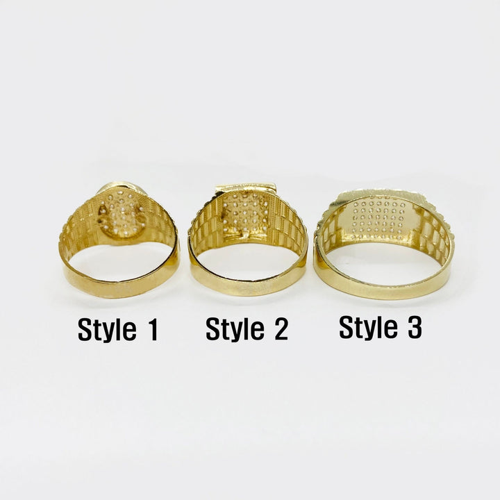 Three 10k - 14k Gold Rollie rings with different designs back view on a white background