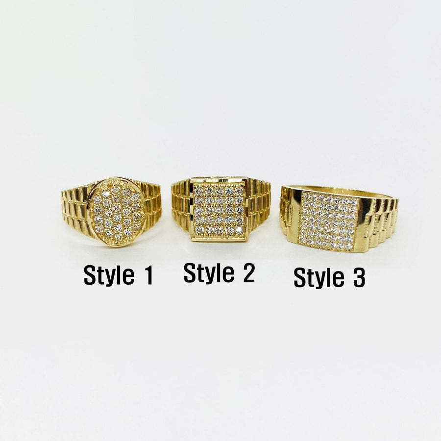 Three 10k - 14k Gold Rollie rings with different designs on a white background