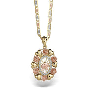 Ornate yellow and rose gold pendant showcasing an intricate floral design.