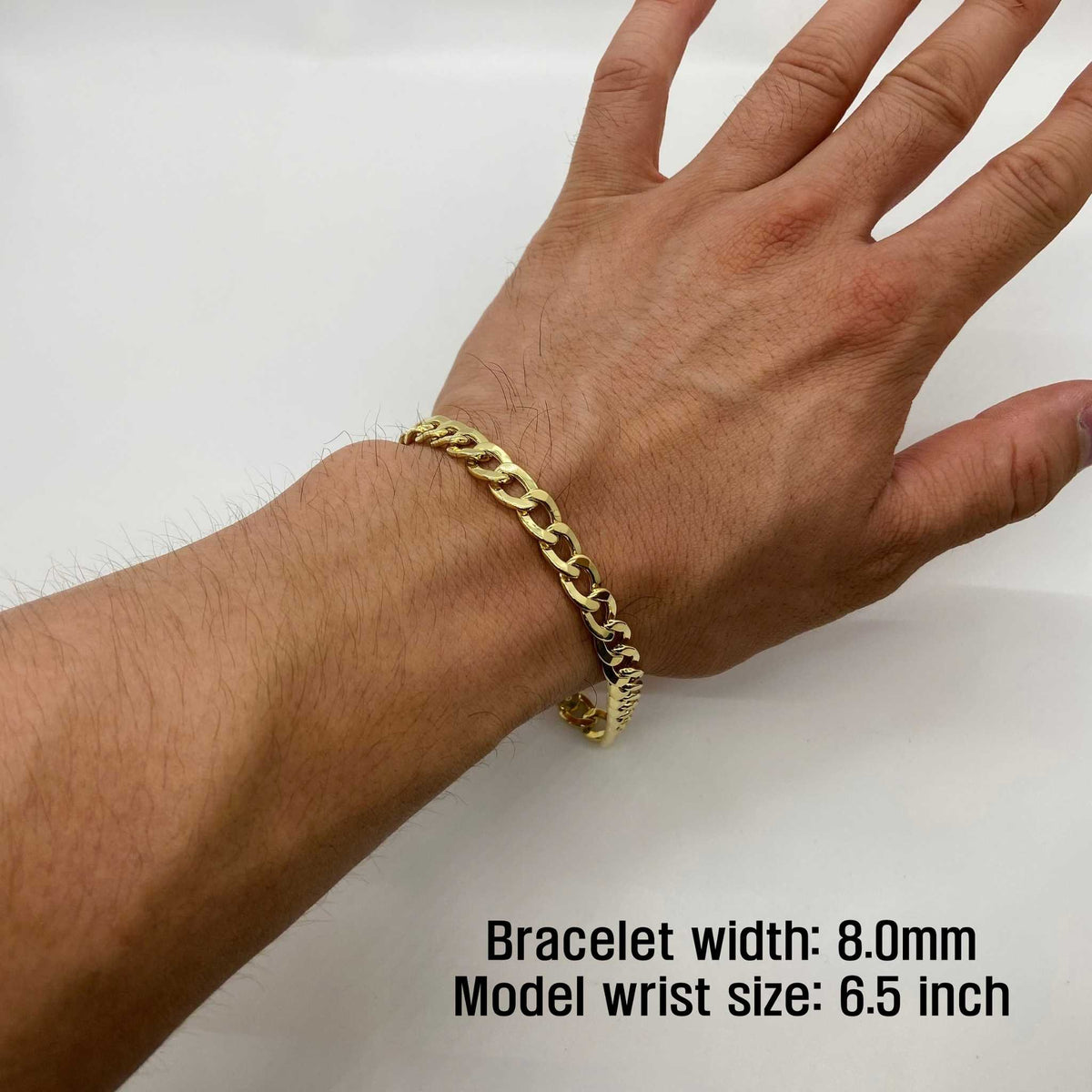 8.0mm 14K gold Cuban curb link chain bracelet worn on a 6.5-inch wrist.