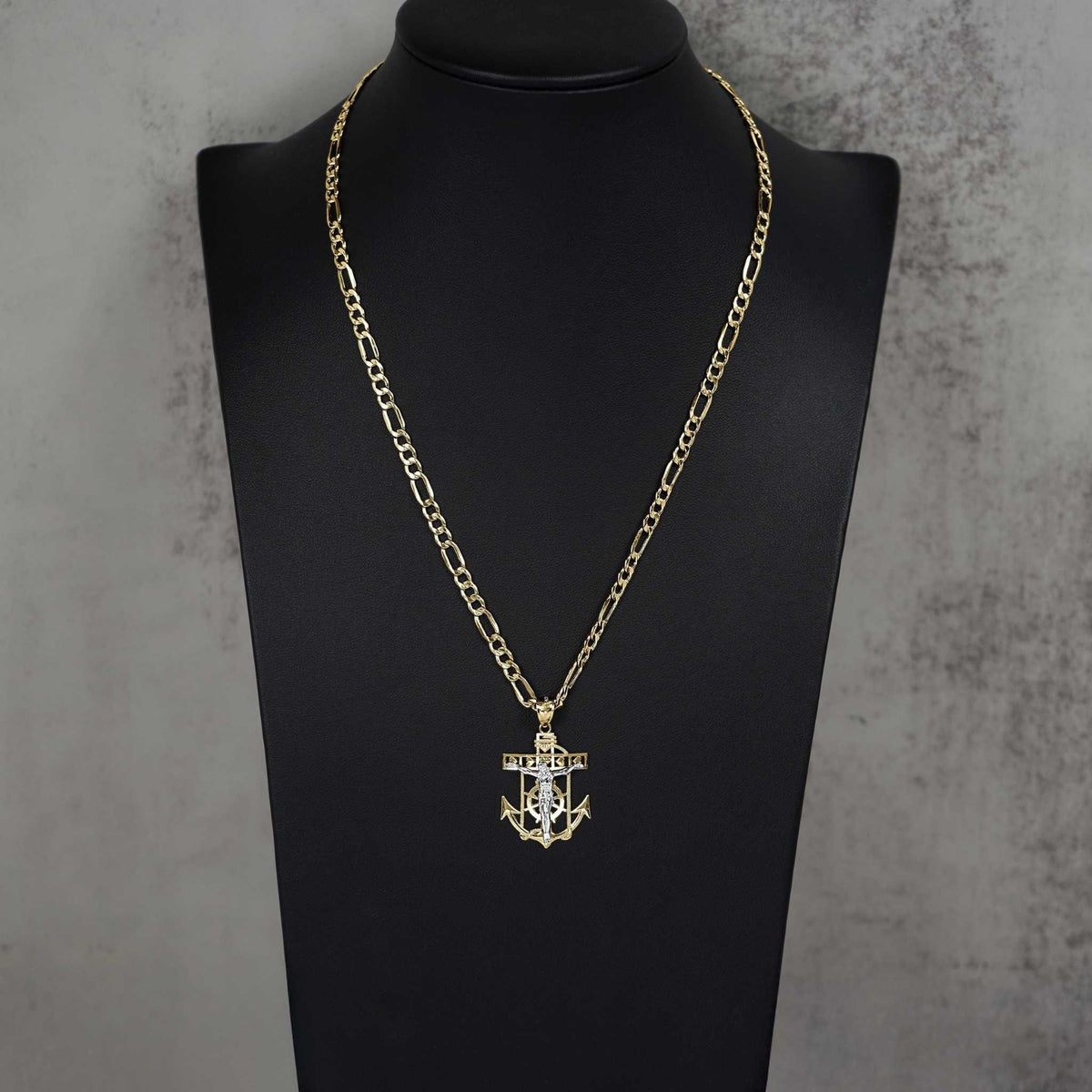 14k two-tone gold crucifix anchor pendant necklace displayed on a black mannequin bust.