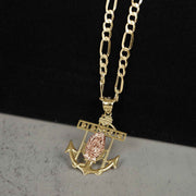 Angled close-up view of a 14k two-tone gold Guadalupe anchor pendant necklace on chain.