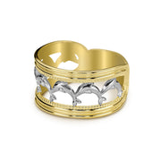 Angled view of a 14k yellow gold wide band ring with white gold dolphins.