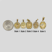 Five 14k gold baptism pendant styles displayed next to a quarter for size scale