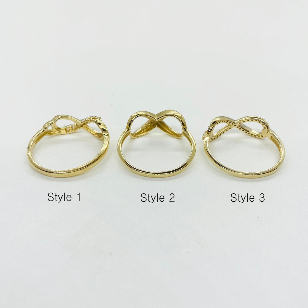 Three 14k gold infinity rings backview labeled Style 1, Style 2, and Style 3 