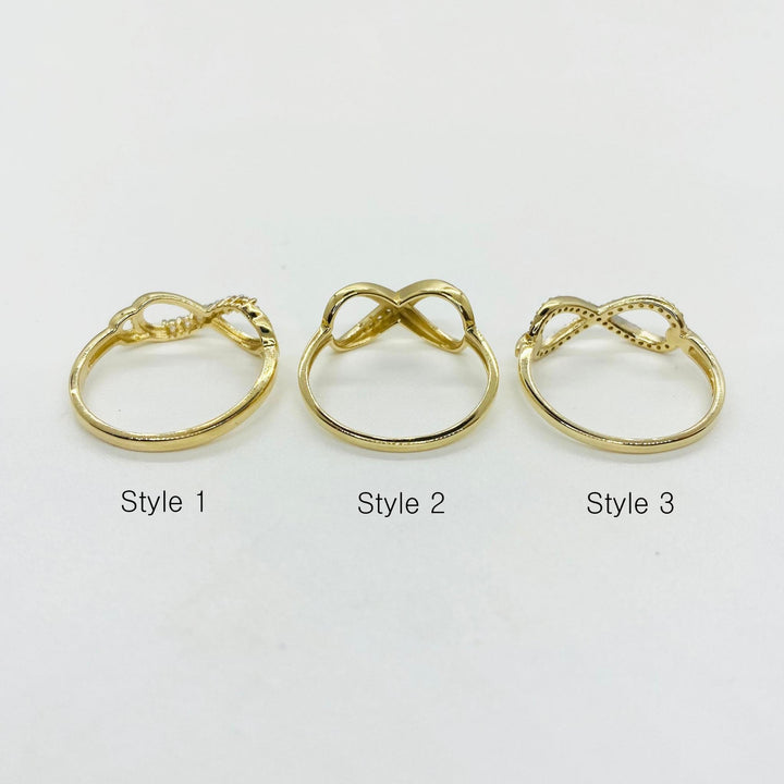 Three 14k gold infinity rings backview labeled Style 1, Style 2, and Style 3 