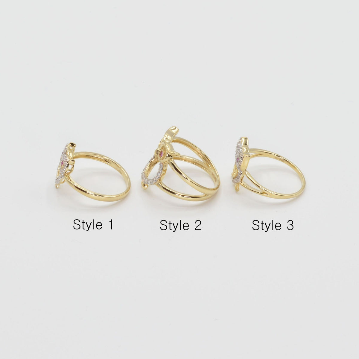 Three 14k gold owl rings sideview labeled Style 1, Style 2, and Style 3 