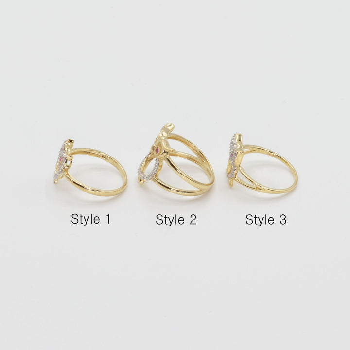 Three 14k gold owl rings sideview labeled Style 1, Style 2, and Style 3 