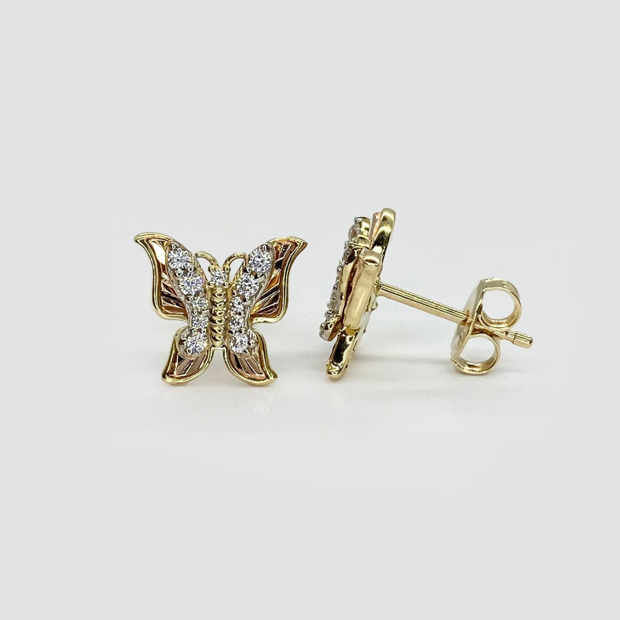 14k gold Aura butterfly stud earrings with tri-color filigree wings and clear cubic zirconia accents.