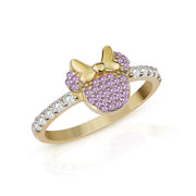 14k gold ring featuring a mouse head outline paved with purple stones and a gold bow.