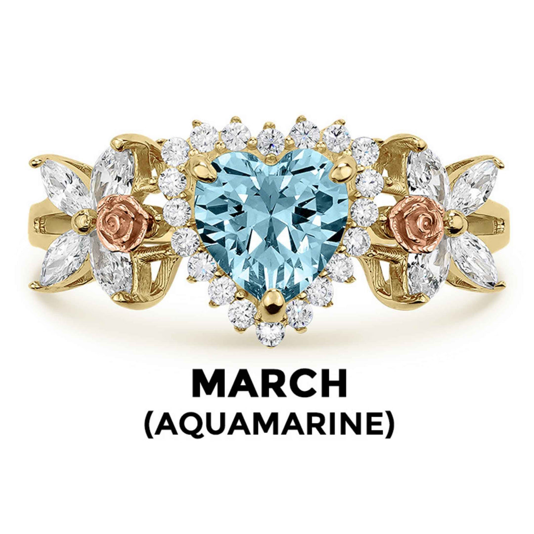 14k gold heart ring with light blue aquamarine birthstone and March text label.