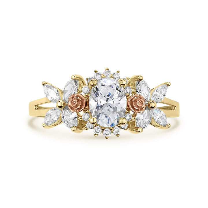 14k gold birthstone ring with a halo-set oval cz and rose gold flower details