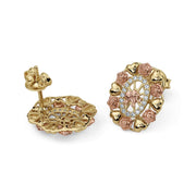 Back view of 14k tricolor gold oval earrings showing the post and clutch backing.