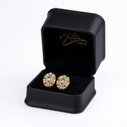 Model wearing the large 20.0mm tricolor gold elephant oval stud earring.