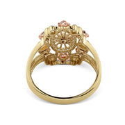 Bottom view of a tricolor 14k gold oval elephant ring showing interior craftsmanship.
