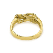 Rear view of a 14k yellow gold buckle infinity ring on a white background
