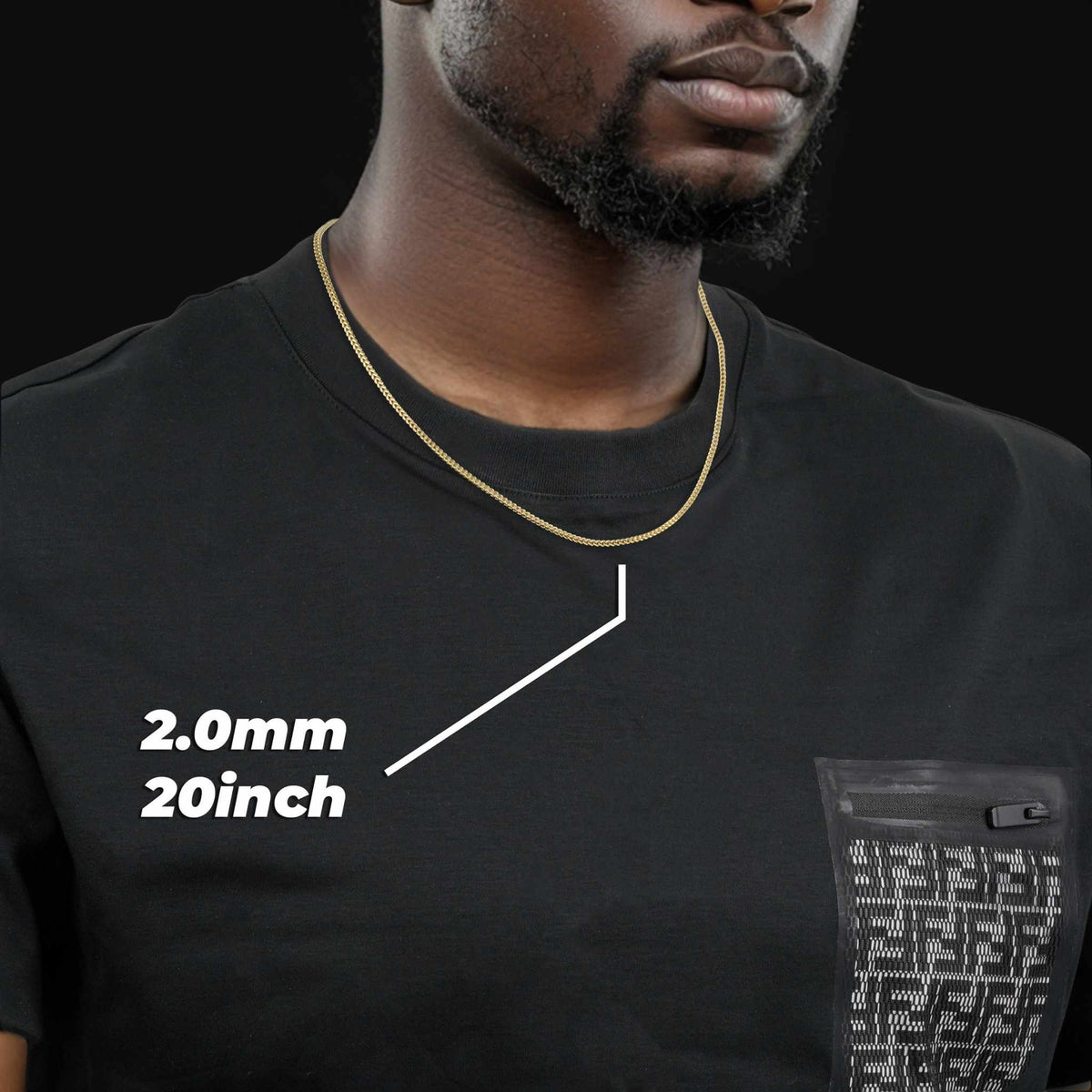 Model wearing a 2.0mm, 20-inch 14k gold classic Franco chain over a black t-shirt.