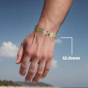 Model wearing a 12.0mm 14k gold classic nugget link bracelet with text overlay.