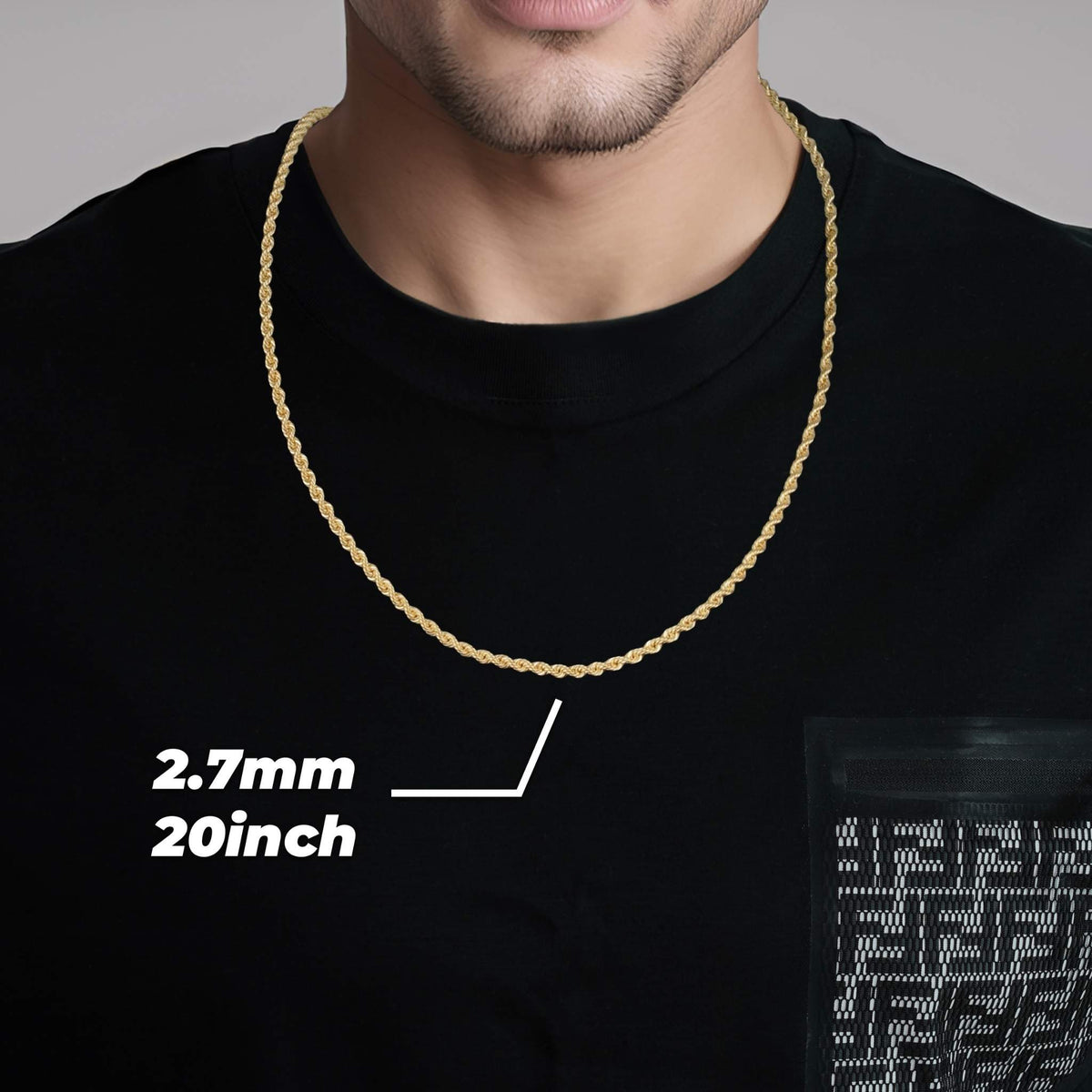 Model wearing a 2.7mm, 20-inch 14k gold rope chain over a black shirt.