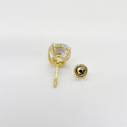 Back view of 14k yellow gold round solitaire CZ stud earrings, showing the post and secure screw back.