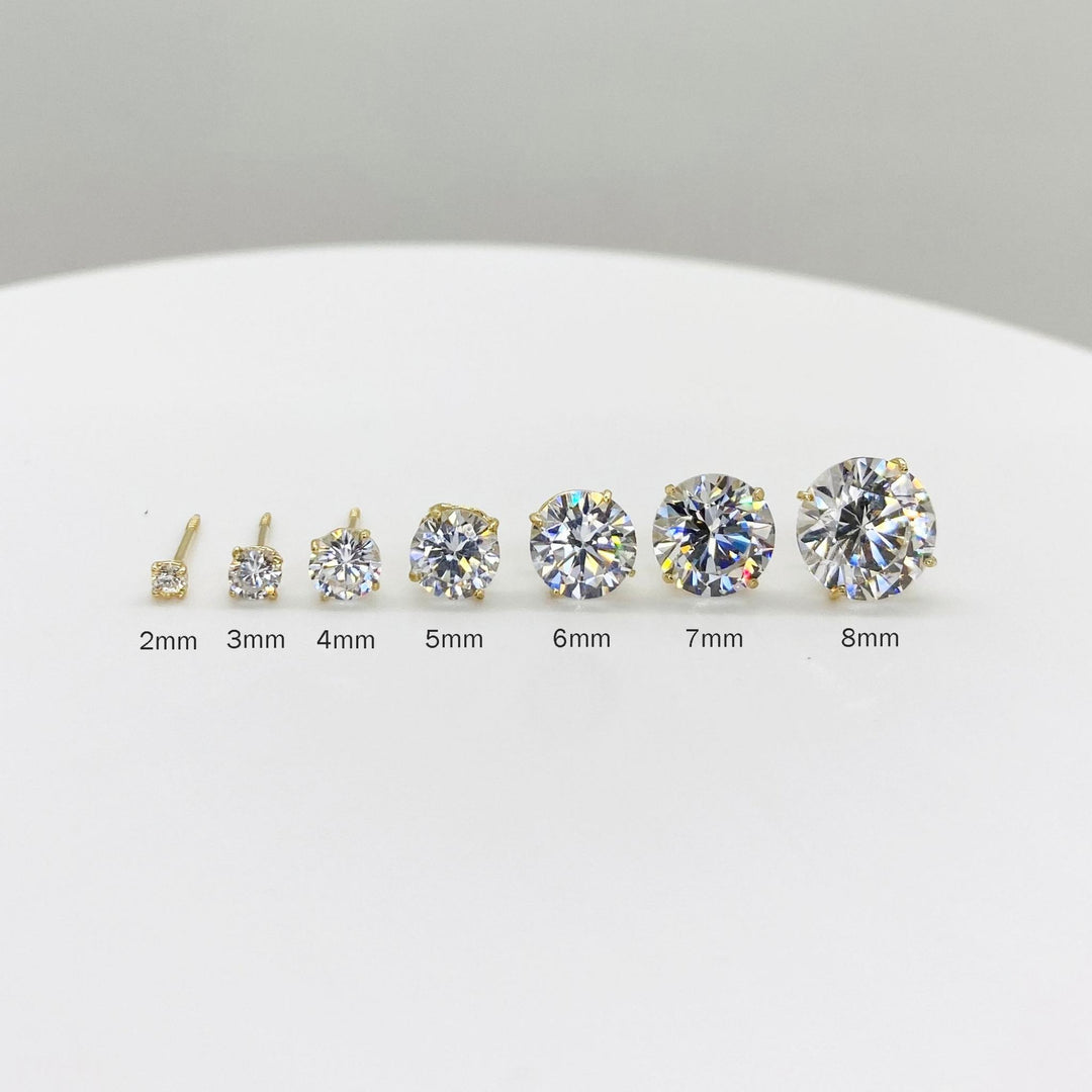 Visual comparison chart of 14k yellow gold cubic zirconia stud earrings, showing diameters ranging from 2mm to 8mm.